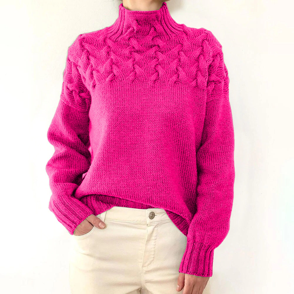 Light pink Tessa turtleneck sweater for women from Christine Brewer, featuring cozy knitwear and a classic turtleneck design.