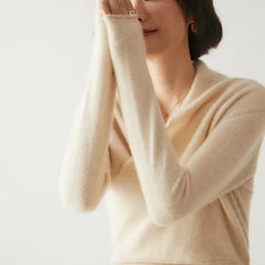 Christine Brewer Dawn cashmere sweater for women, soft beige knit with a relaxed fit and cozy collar, shown on a model.