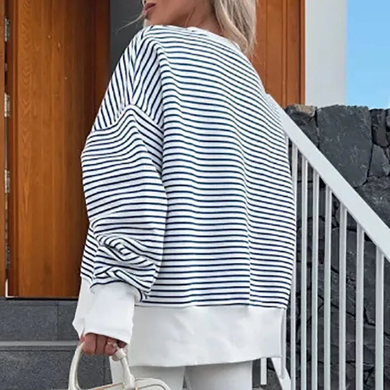 Christine Brewer Haven striped women's sweatshirt featuring blue and white horizontal stripes and a casual fit.