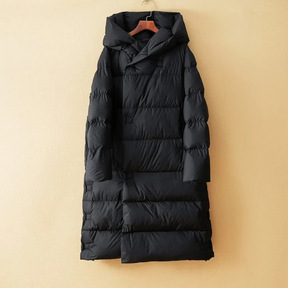 Long hooded women's parka from Christine Brewer's Ava collection, featuring a stylish design and warm, weather-resistant fabric.