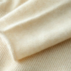 Helen women's cashmere sweater by Christine Brewer, soft beige knit with a cozy fit and ribbed cuffs, perfect for winter wear.