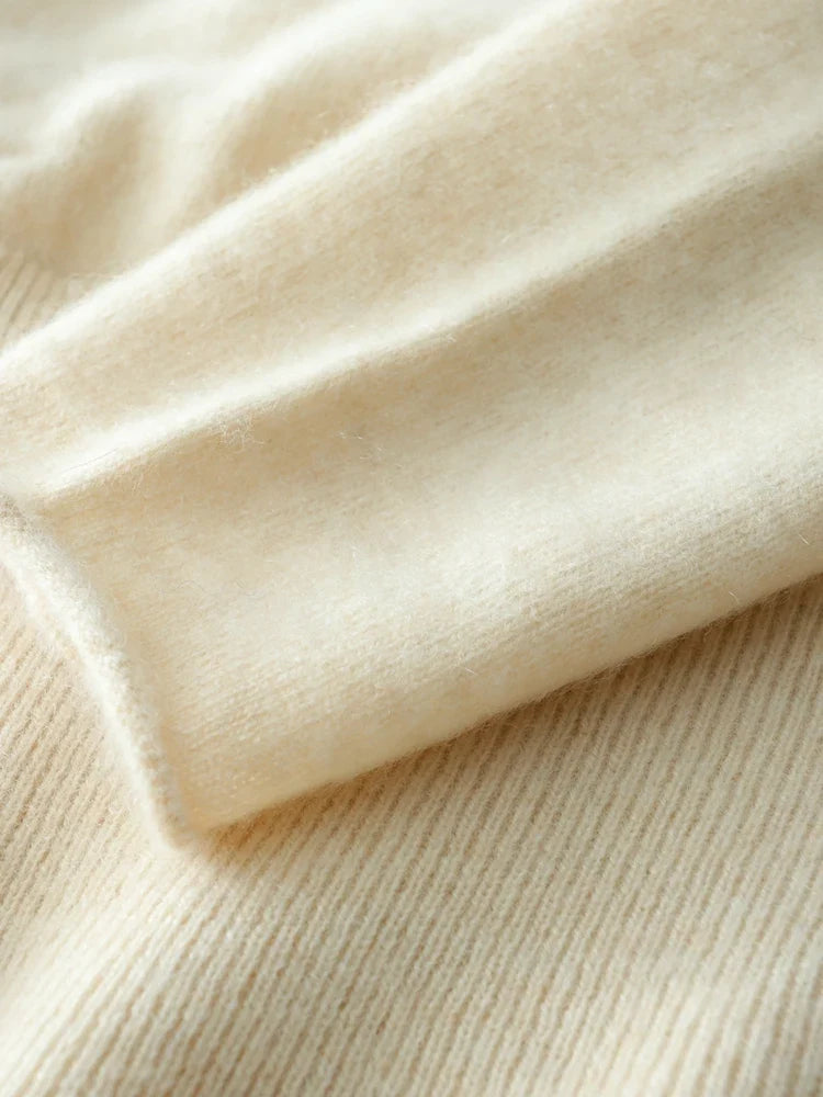 Helen women's cashmere sweater by Christine Brewer, soft beige knit with a cozy fit and ribbed cuffs, perfect for winter wear.