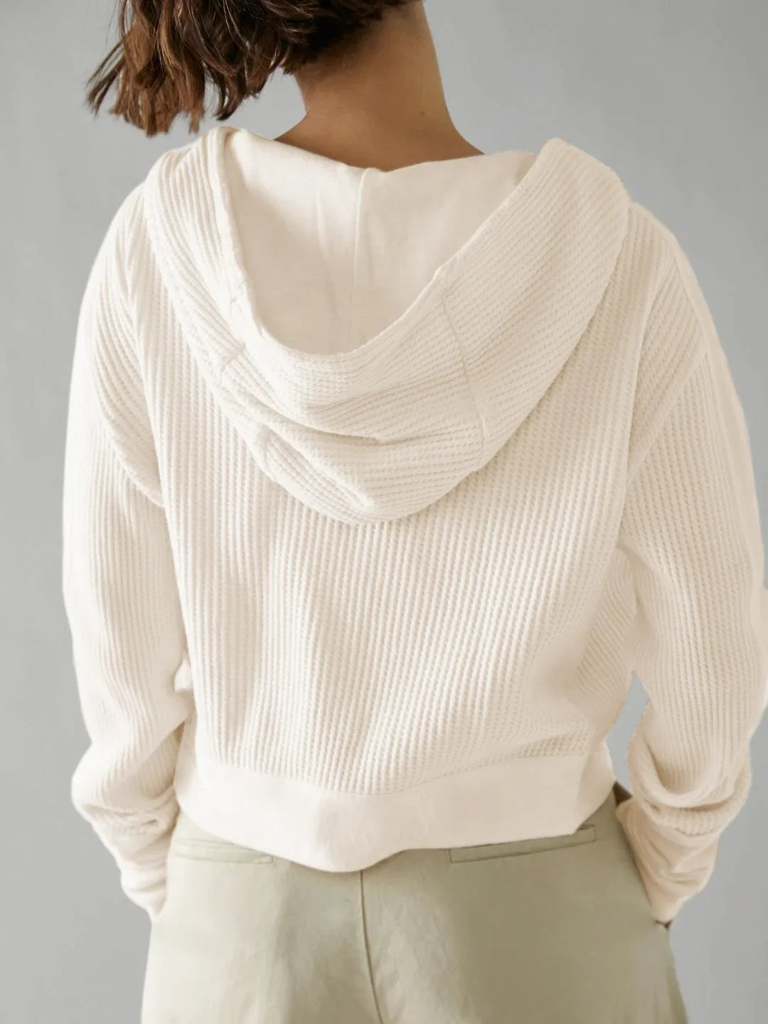 Mia cropped hooded women's hoodie by Christine Brewer, featuring a cozy fit and casual style, shown in the image.