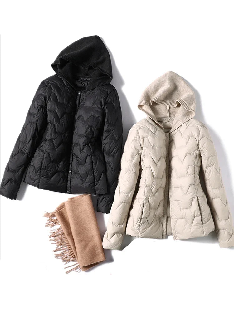 Christine Brewer Zoe hooded quilted puffer jacket for women, featuring a stylish quilted design and a cozy hood.