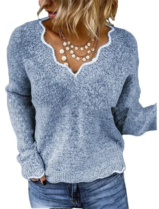 Pink knit sweater for women by Christine Brewer, featuring a cozy, stylish design with a high neckline and textured pattern.