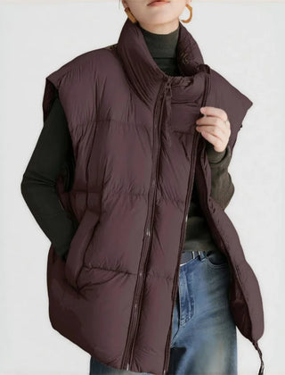 Layla cropped puffer vest for women by Christine Brewer, featuring a stylish quilted design and stand-up collar.