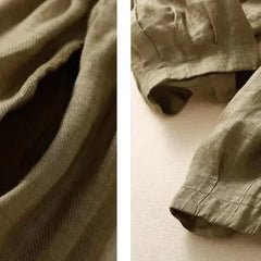 Women’s tapered linen trousers by Christine Brewer featuring loose fit, pull-on style, and lightweight breathable fabric.
