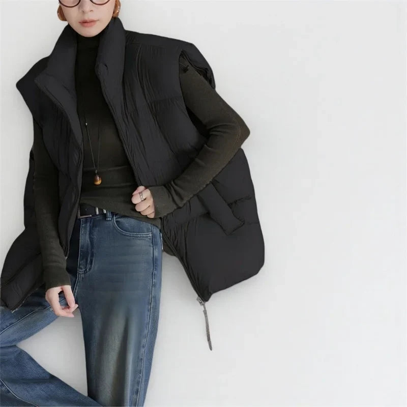 Christine Brewer Layla cropped puffer vest for women, lightweight quilted vest in neutral color, front zipper and high collar.