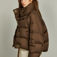 Hannah cropped quilted parka for women by Christine Brewer, shown in a stylish, insulated jacket with a quilted pattern and hood.