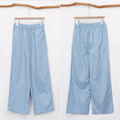 Women’s cotton linen wide-leg drawstring trousers by Christine Brewer, loose pull-on pants with relaxed fit and casual style.