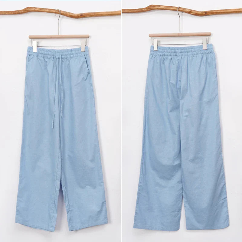 Women’s cotton linen wide-leg drawstring trousers by Christine Brewer, loose pull-on pants with relaxed fit and casual style.