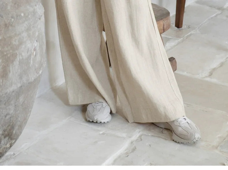 Linen wide-leg trousers for women by Christine Brewer, loose pull-on pants with a relaxed fit and casual style.
