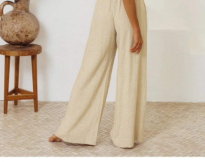 Women's linen wide-leg trousers by Christine Brewer, loose pull-on pants showcasing a relaxed fit and breathable fabric.