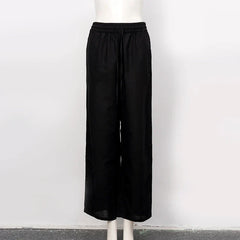 Women’s loose cotton linen wide-leg trousers with drawstring waist by Christine Brewer, pull-on style, casual and comfortable fit.