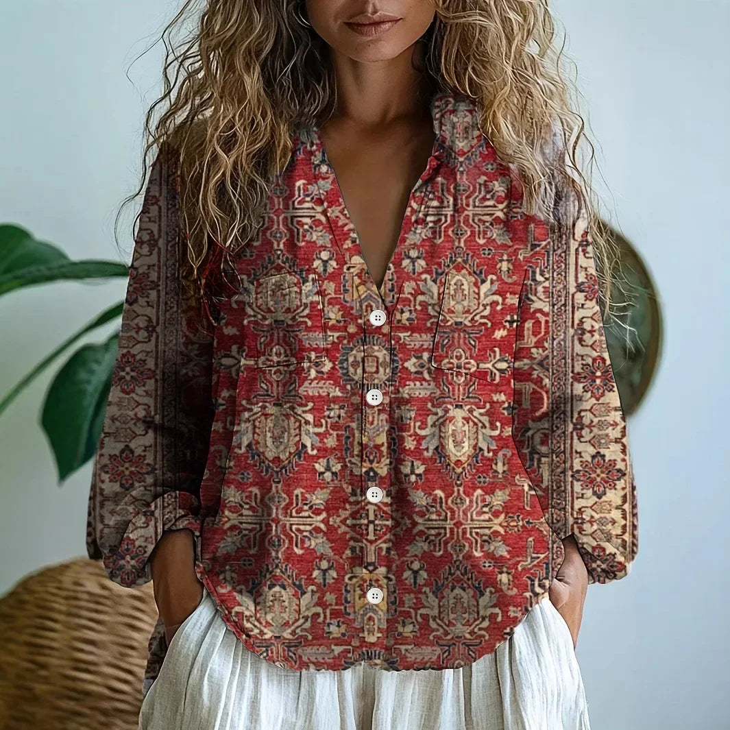 Amelia graphic blouse for women by Christine Brewer, featuring a stylish, patterned top with a comfortable fit and vibrant design.
