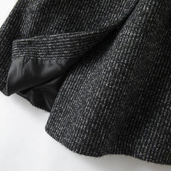 Longline belted tweed coat for women by Christine Brewer, featuring a stylish design and textured fabric.