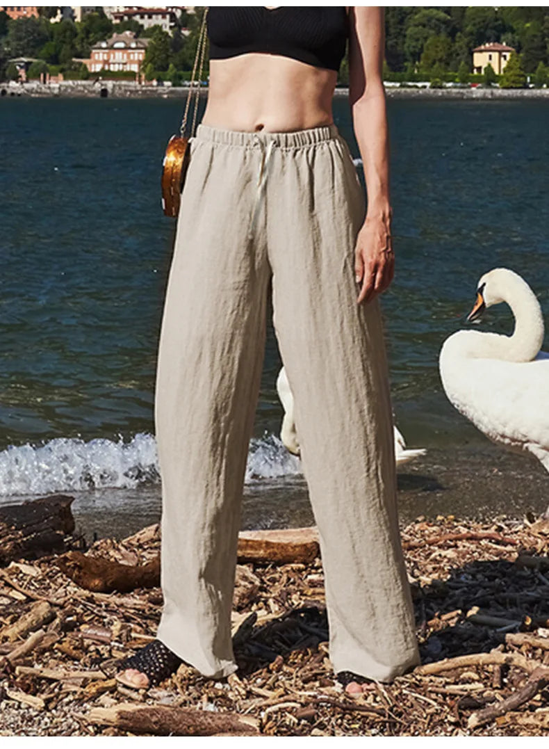 Women’s knit wide-leg drawstring trousers by Christine Brewer, loose pull-on pants with a relaxed fit and comfortable waistband.