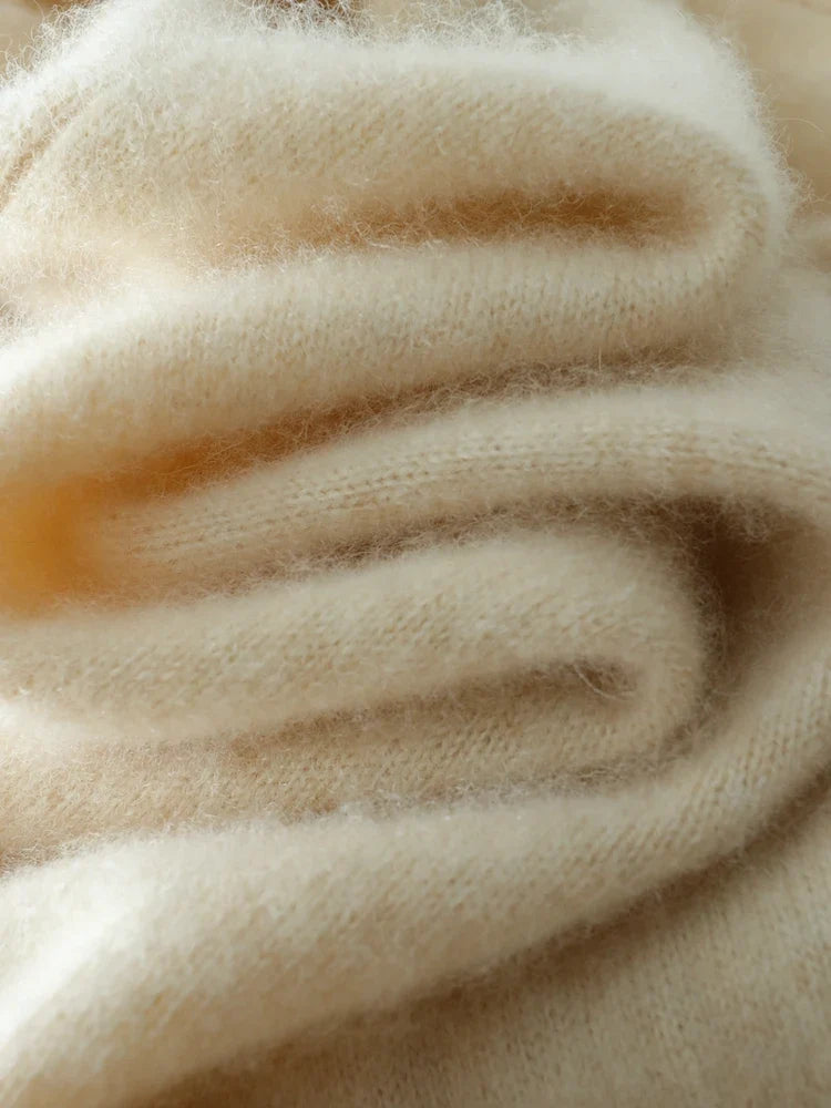 Women’s Dawn cashmere sweater by Christine Brewer, soft beige knit with long sleeves and a cozy, elegant fit.