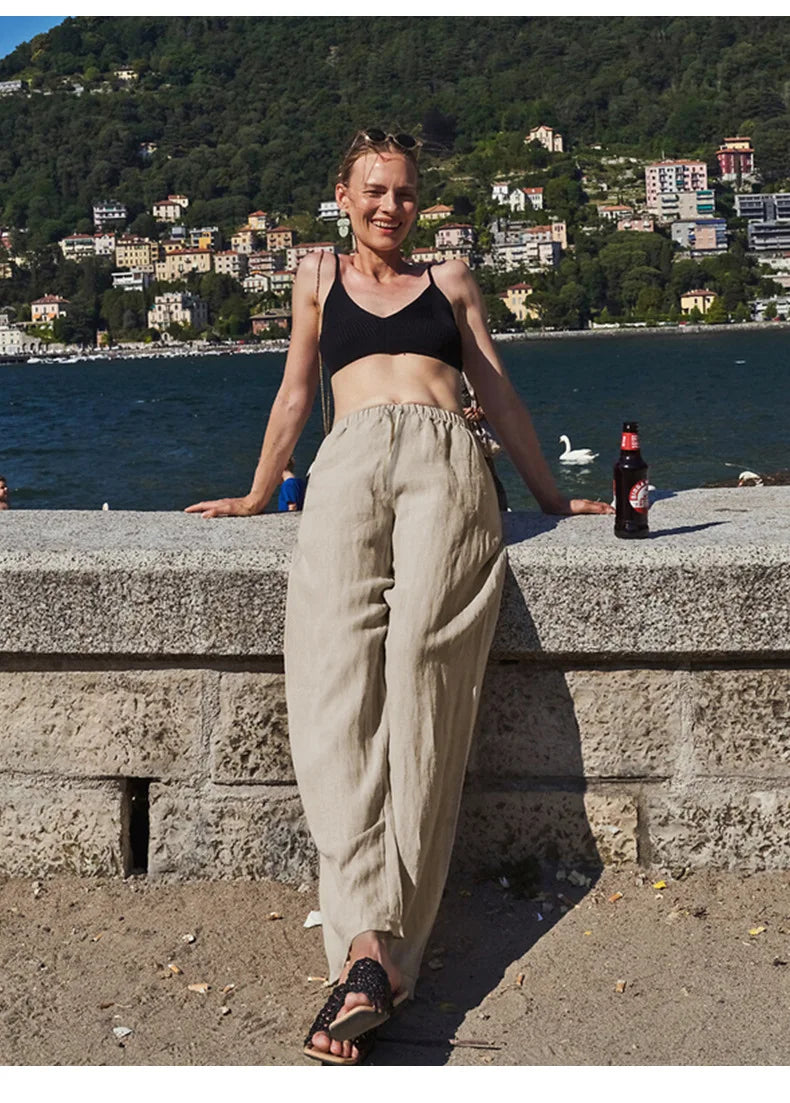 Knit wide-leg drawstring trousers for women by Christine Brewer, loose pull-on pants with a relaxed fit and comfortable design.