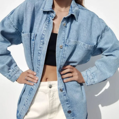 Nora relaxed denim shirt jacket for women by Christine Brewer, shown in light blue with button-up front and classic collar.
