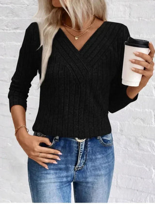 Kaitlyn striped women's sweater by Christine Brewer, featuring a cozy knit fabric with colorful horizontal stripes.