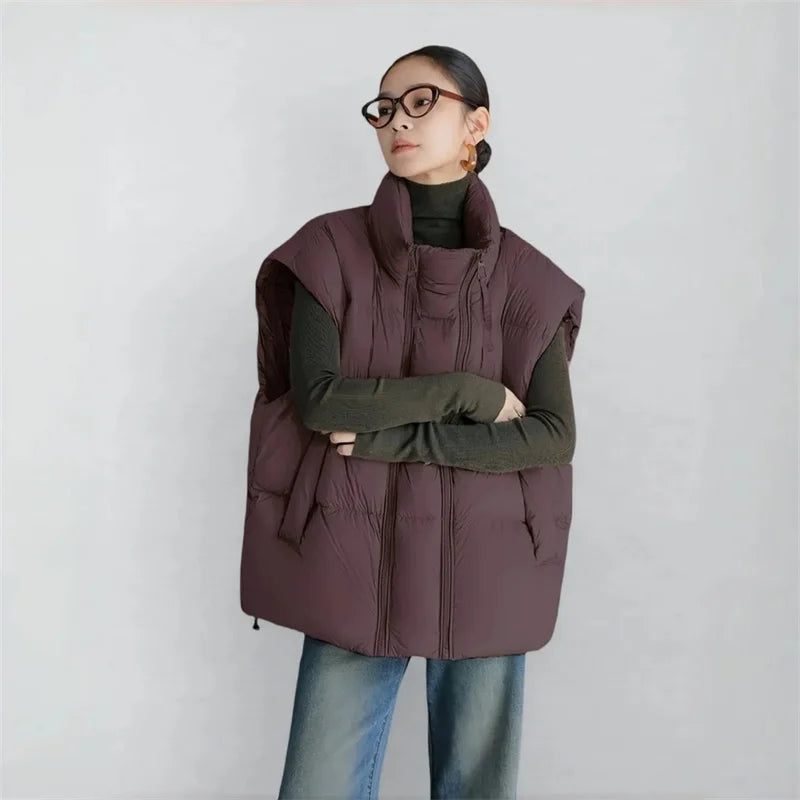 Christine Brewer Layla cropped puffer vest for women, lightweight quilted vest with a stand collar and side pockets.