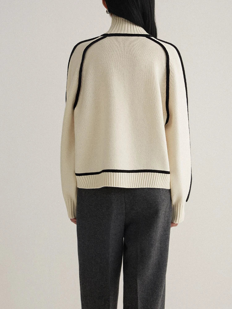 Christine Brewer Eva loose fit roll neck sweater in a tailored chic style, featuring a cozy, relaxed fit and classic neckline.