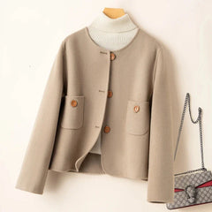 Elegant wool coat for women by Christine Brewer, featuring a tailored fit and classic design in a sophisticated style.