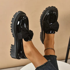Christine Brewer Garisa platform shoes for women with orthopedic comfort and stylish walking design, featuring a sleek black finish.