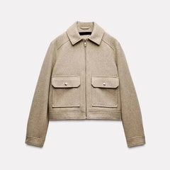Christine Brewer Isla cropped zip-up utility jacket for women, shown in a stylish, functional design with multiple pockets and a zip closure.