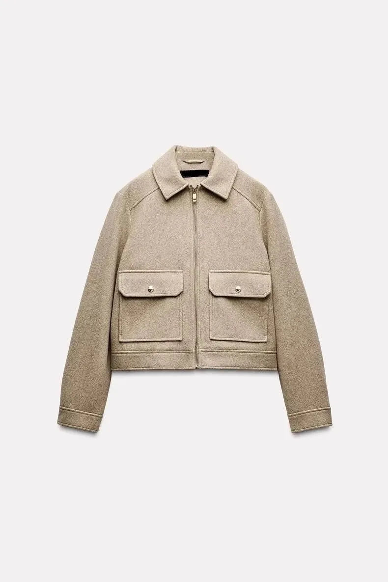 Christine Brewer Isla cropped zip-up utility jacket for women, shown in a stylish, functional design with multiple pockets and a zip closure.
