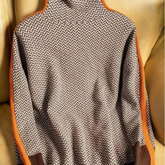 Cream-colored Sofia turtleneck sweater for women from Christine Brewer's #1752 Collection, featuring a cozy, fitted design.