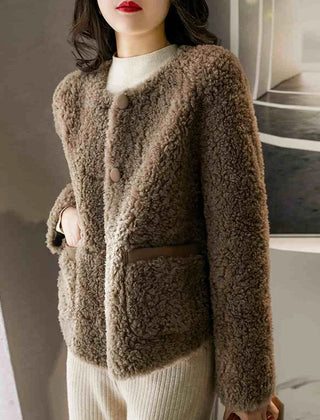 Emily glamorous faux fur coat for women by Christine Brewer, shown in a stylish, plush design perfect for cold weather.
