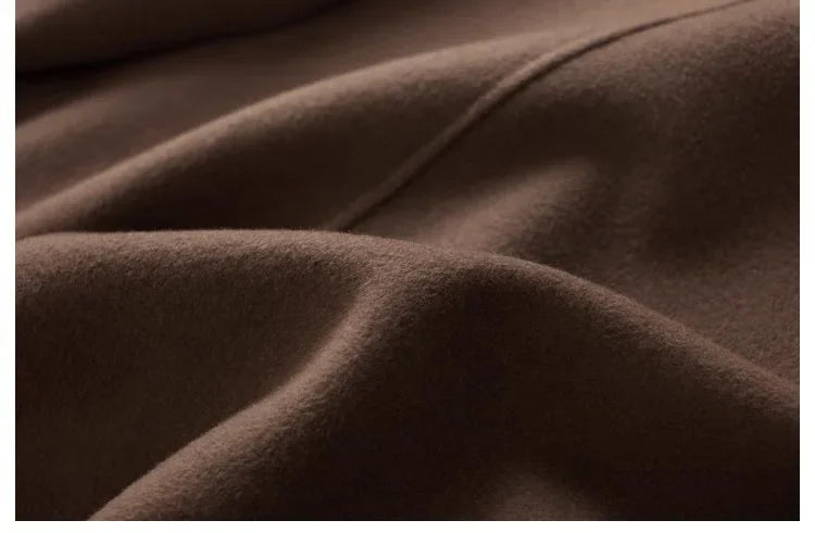 Brown double-breasted wool coat for women by Christine Brewer, featuring a stylish fit and classic design.