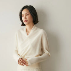 Women’s cream cashmere sweater by Christine Brewer, featuring a cozy, soft knit with a classic crew neck and long sleeves.