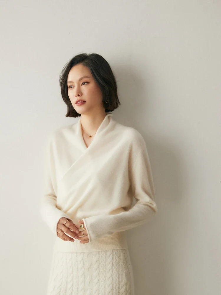 Women’s cream cashmere sweater by Christine Brewer, featuring a cozy, soft knit with a classic crew neck and long sleeves.