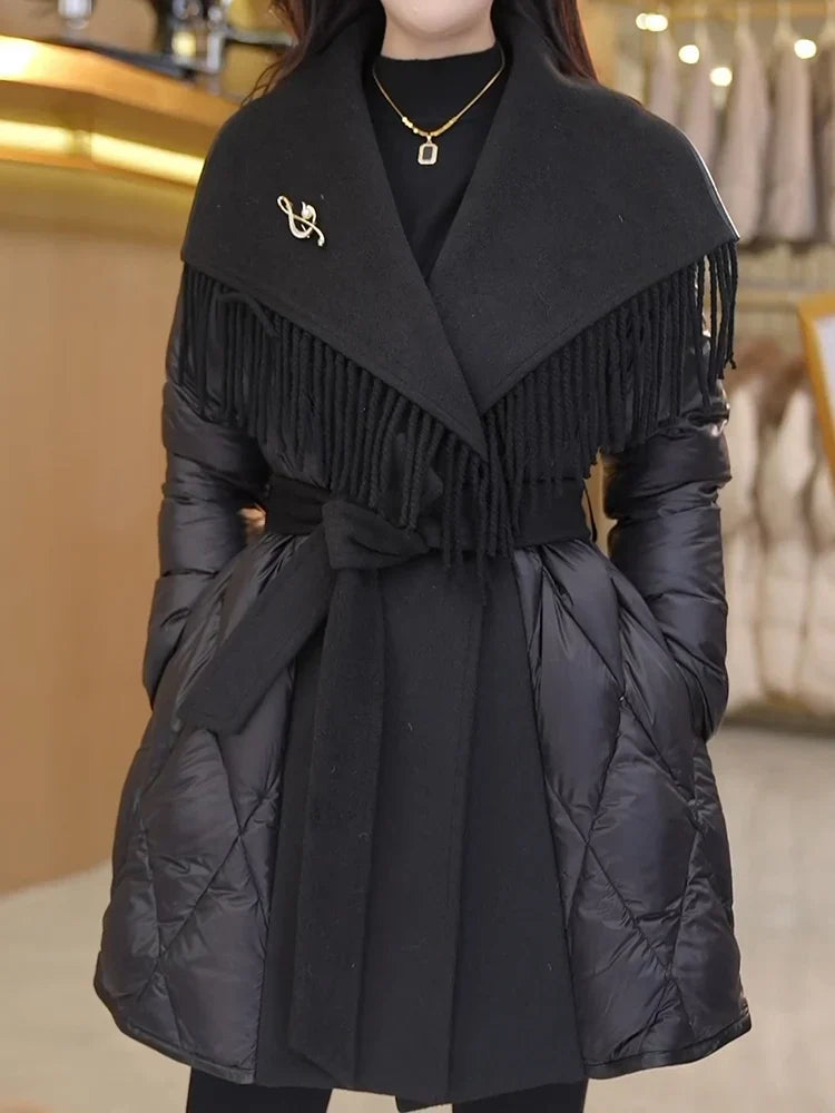 Christine Brewer Stella belted quilted puffer jacket for women, showcasing a stylish, insulated winter coat with a belt and quilted design.