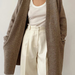 Women’s Jacqueline Merino Wool Cardigan by Christine Brewer, featuring a cozy knit design in a neutral color.