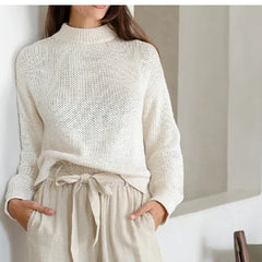 Light beige linen wide-leg trousers for women with a loose pull-on style, designed by Christine Brewer.
