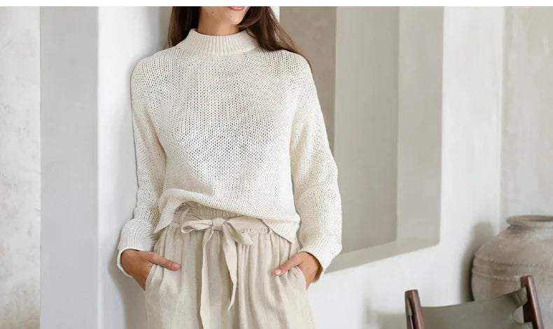 Light beige linen wide-leg trousers for women with a loose pull-on style, designed by Christine Brewer.