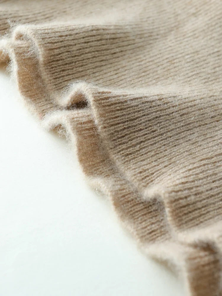 Women’s Dawn cashmere sweater by Christine Brewer, soft beige knit with long sleeves and a cozy fit.