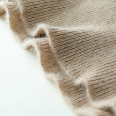 Helen cashmere sweater for women by Christine Brewer, featuring a cozy, soft-knit design in a neutral color.