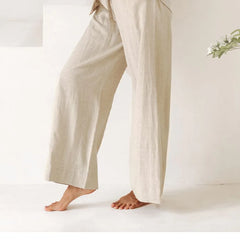 Women’s linen wide-leg trousers by Christine Brewer, loose pull-on pants with relaxed fit and casual style.
