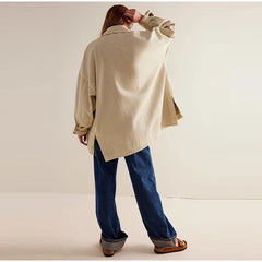 Charlotte oversized denim shirt jacket for women by Christine Brewer, featuring classic blue denim and button-front design.