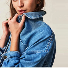 Charlotte oversized denim shirt jacket for women by Christine Brewer, shown in classic blue denim with a relaxed fit.
