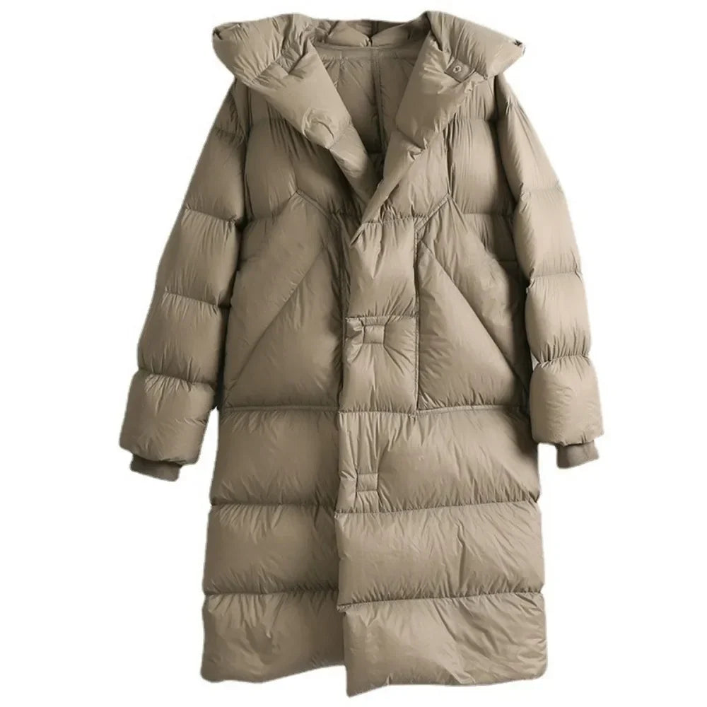 Long belted puffer jacket for women by Christine Brewer, featuring a stylish design and quilted insulation in a versatile color.