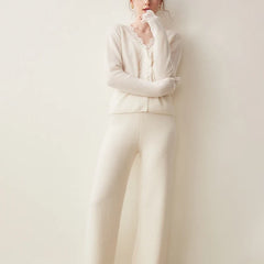 Elsa cashmere cardigan for women by Christine Brewer, soft beige knit with button closure and ribbed cuffs and hem.