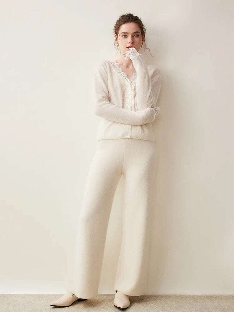 Elsa cashmere cardigan for women by Christine Brewer, soft beige knit with button closure and ribbed cuffs and hem.