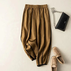 Women’s linen wide-leg elastic-waist trousers by Christine Brewer, loose pull-on pants with relaxed fit and breathable fabric.
