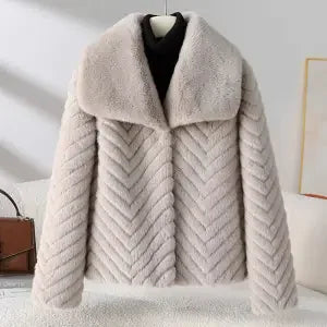Christine Brewer Nova short faux fur coat for women, beige and plush, stylish winter outerwear with a cozy, luxurious texture.